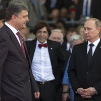Putins un Porošenko telefonsarunā pārrunā iespējamo pamieru