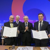 Kučinskis Parīzē paraksta līgumu par Latvijas pievienošanos bagāto valstu klubam OECD