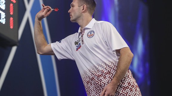 Razma debijā 'World Matchplay' turnīrā zaudē ranga līderim Razma debijā 'World Matchplay' turnīrā zaudē ranga līderim