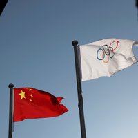 Ķīnas varasiestādes jaunā Covid-19 paveida dēļ nesaskata draudus olimpiskajām spēlēm