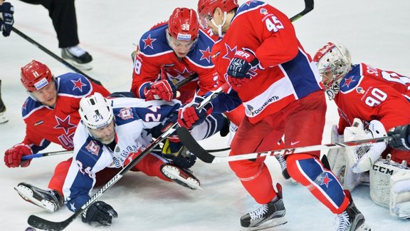 CSKA s Sergei Andronov, Torpedo s Alexander Frolov, CSKA s Mikhail Naumnko, CSKA s Alexander Kutuzov, CSKA goalie Alexander Sorokin