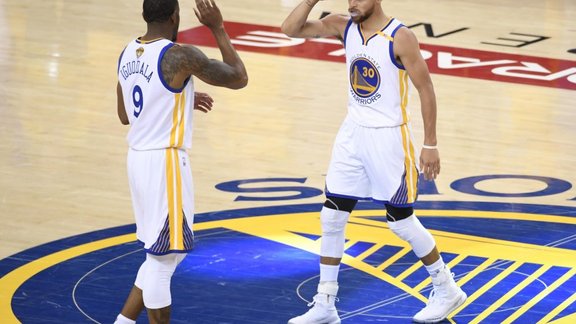 Golden State Warriors Stephen Curry with Andre Iguodala