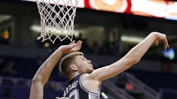 San Antonio Spurs Davis Bertans blocks-shot of Phoenix Suns Devin Booker