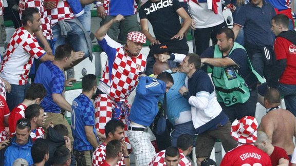 Croatia fans clash during the game 