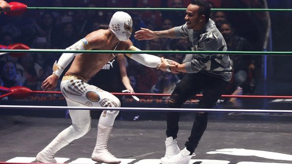 Formula-1 driver Lewis Hamilton with Mexican wrestlers