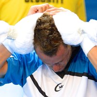 Foto: 'Australian Open' dalībniekiem jācīnās ar pamatīgu svelmi