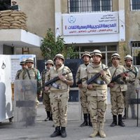 Pastiprinātas drošības apstākļos Ēģiptē sācies referendums par jauno konstitūciju