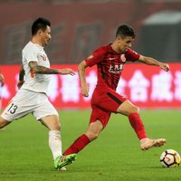 Bagātajā Ķīnas futbolā grasās ieviest algu griestus