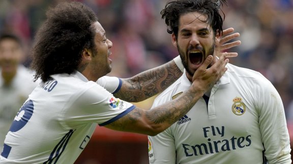 Real Madrid Francisco "Isco" Alarcon celebrates with Marcelo 