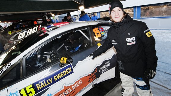 Mads Ostberg opens his Ford Fiesta