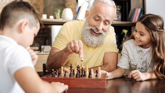 play,pupils,mature,retirement,social security,children,pensioner,grandfather,parenting,generation,development,chess,grandchildren,waist up,old,chessboard,adulthood,senior,baby boomer,grandparent,pawn,care,love,game,elderly,smart,selective focus,society,te