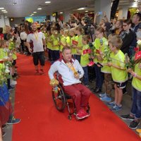 ФОТО: Латвийские паралимпийцы вернулись на родину
