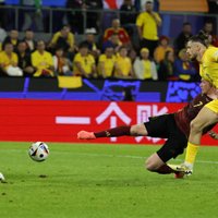 Beļģijas futbola zvaigznes salauž varonīgo rumāņu sirdis