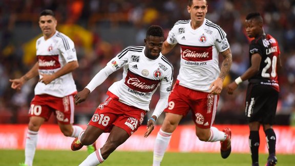 Victor Malcorra, Aviles Hurtado, Milton Caraglio of Tijuana celebrate goal 