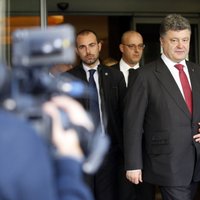 Putins un Porošenko vienojušies par pilnīgu Minskas vienošanās ievērošanu, paziņo Barrozu