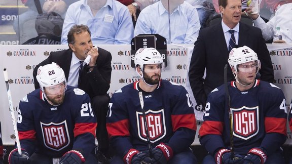 USA coach John Tortorella, assistant coach Phil Housley, players Blake Wheeler (26), Ryan Kesler (17), David Backes 