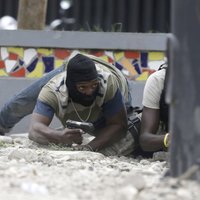 Foto: Haiti izceļas apšaude starp policiju un armiju