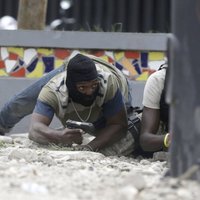 Foto: Haiti izceļas apšaude starp policiju un armiju