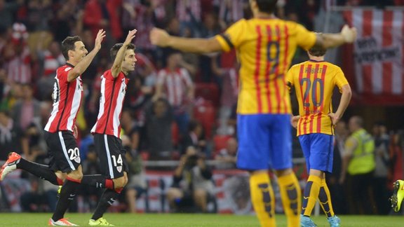 Athletic Bilbao s Aduriz and Susaeta celebrate a goal by San Jose during their Spanish Super Cup