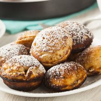 Pufīgās pankūciņas 'aebleskiver', ko dāņi Ziemassvētku laikā bauda ar karstvīnu