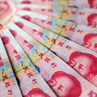 Ķīnietis sievai kāzās uzdāvina 102 kilogramus naudas