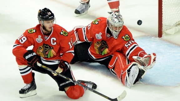 Jonathan Toews and Corey Crawford (Chicago)