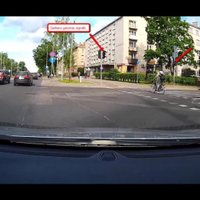Video: Špetna velosipēdiste aizlaiž pie sarkanā