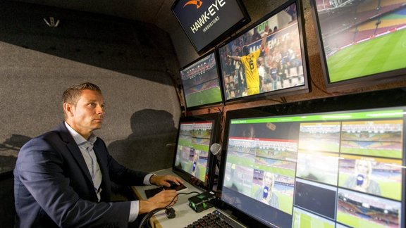 A referee looks broadcast Netherland Cup football match Ajax - Willem II