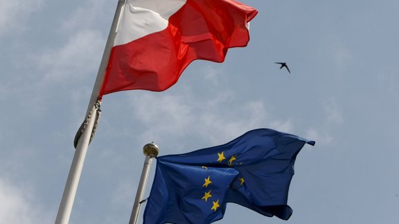 The flags of Poland and European Union