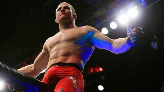 Misha Cirkunov of Latvia celebrates victory over Nikita Krylov 