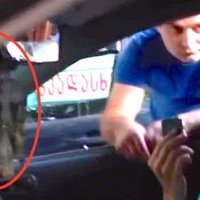 Video: Gruzijā autovadītājam liek noņemt Georga lentīti