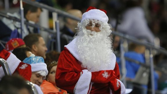 fan dressed as Santa Claus 