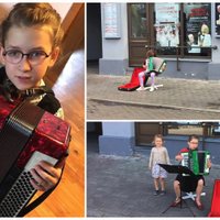 9 gadus veca meitene, muzicējot uz ielas, nopelna sev jaunu akordeonu; par un pret viedokļi