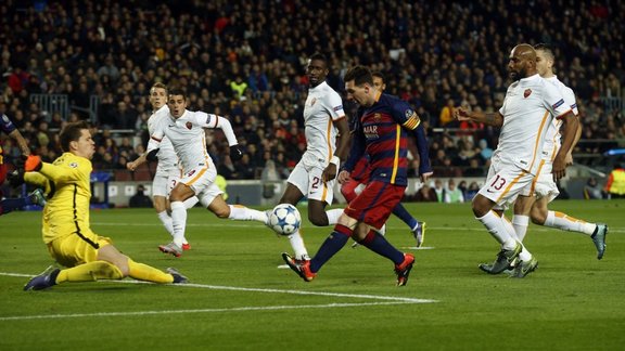 Barcelona s Lionel Messi scores the second goal against AS Roma