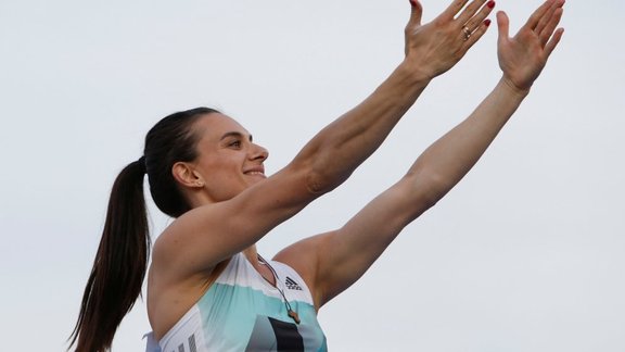 Yelena Isinbayeva greets spectators