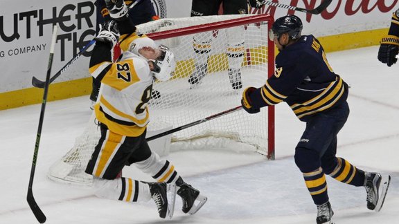 Pittsburgh Sidney Crosby reacts after hit Buffalo Evander Kane