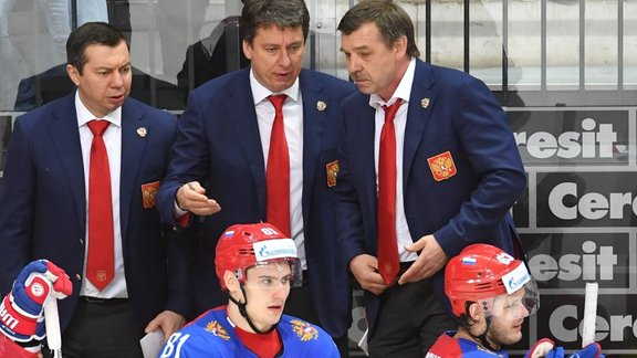 Russian team s coaches Ilya Vorobyov and Harijs Vitolins and head coach Oleg Znarok