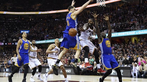 Cleveland Cavaliers guard Kyrie Irving vs Golden State Warriors Draymond Green (23), Klay Thompson (11)