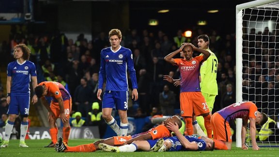 Man City players react after missing a chance to score