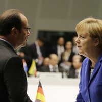 Олланд и Меркель планируют новые переговоры с Путиным и Порошенко