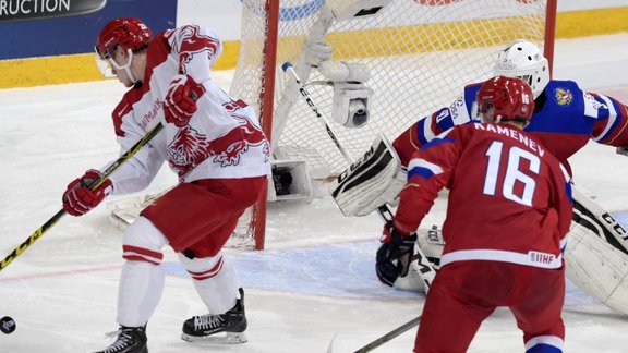 Danish Emil Christiansen scores Russian Vladislav Kamenev and goalkepper Alexander Georgiev