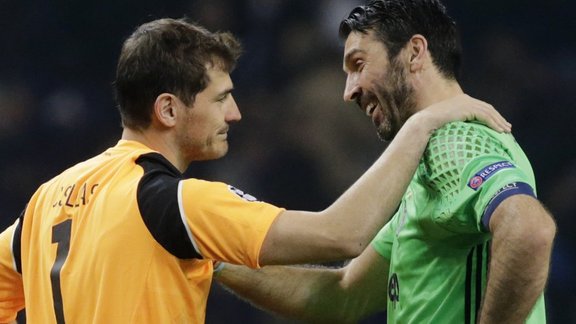 Juventus Gianluigi Buffon with FC Porto s Iker Casillas