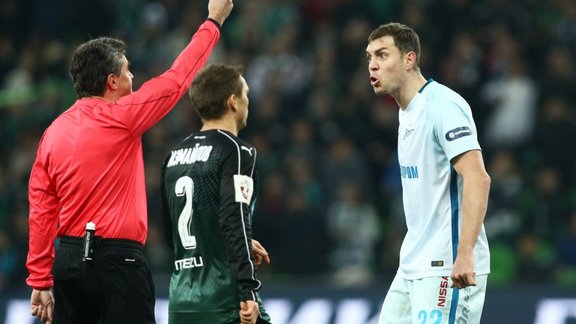 Artyom Dzyuba receives a yellow card