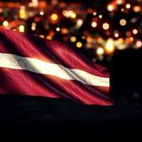 Австрийцы справили в Вецриге нужду, украли флаг Латвии и ходили с ним по городу