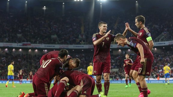 Russia s players celebrate a goal of Artyom Dzyub