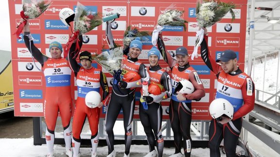 Peter Penz/Georg Fischler, Austria, left, Germany Toni Eggert/Sascha Benecken, Andris Sics/Juris Sics, Latvia in Lake Placid, 