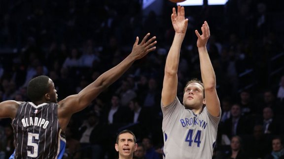 Orlando Magic coach James Borrego, guard Victor Oladipo, Brooklyn Nets guard Bojan Bogdanovic