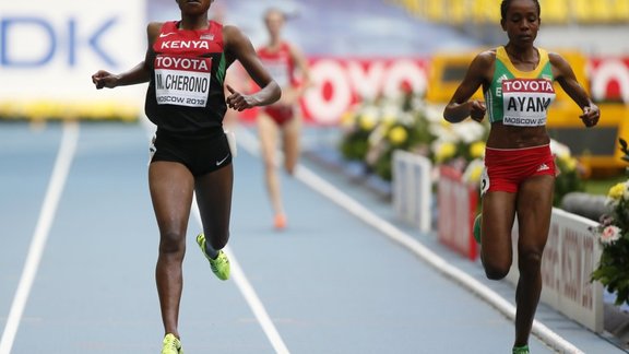 Mercy Cherono of Kenya (L), Almaz Ayana of Ethiopia