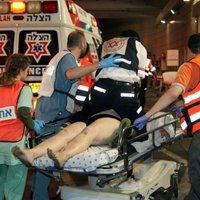 Foto: Apšaudē Izraēlā bojā gājuši trīs cilvēki; vairāki ievainoti