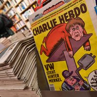 На обложе Charlie Hebdo — Меркель с отрезанной головой соперника по выборам